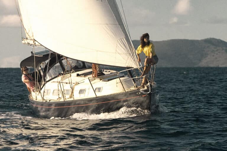 Wild Card sailboat with Jost Van Dyke in the background